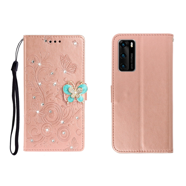 Rose gold embossed leather phone wallet case with butterfly rhinestone clasp and card slots, wrist strap.