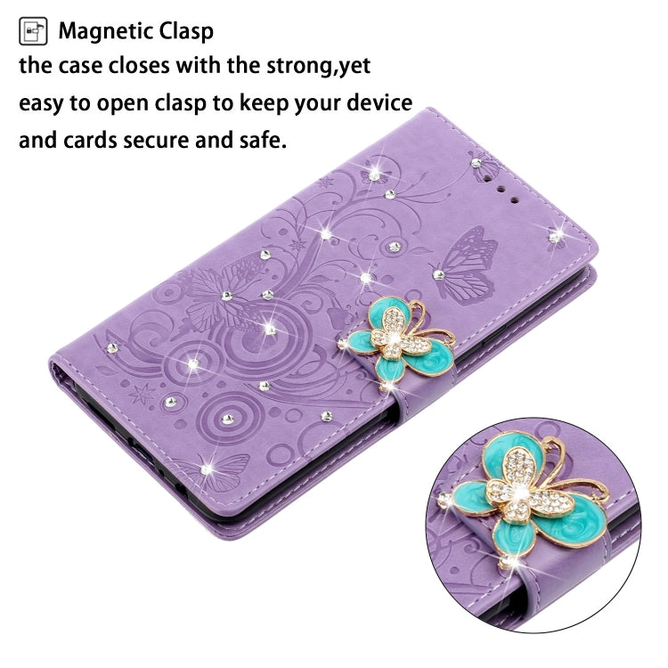 Purple embossed leather phone wallet case with butterfly rhinestone clasp detail