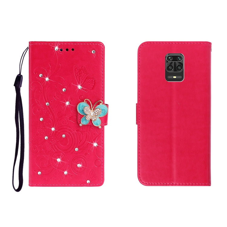 Red embossed leather phone wallet case with butterfly rhinestones and wrist strap