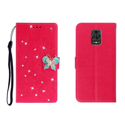 Red embossed leather phone wallet case with butterfly rhinestones and wrist strap
