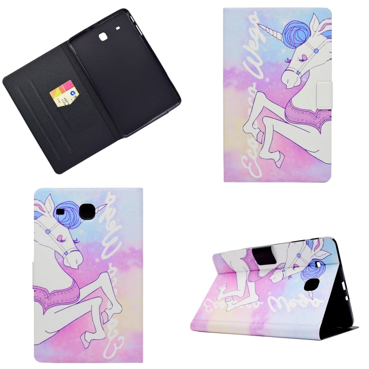Tablet folio case with purple-and-pink unicorn print, open view showing black interior.