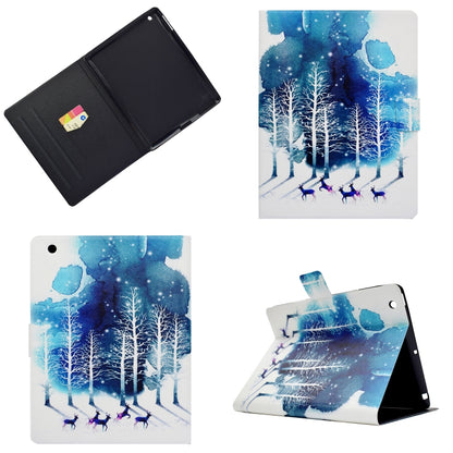 Tablet case with blue snowy forest art, flip cover, and stand-angle viewing