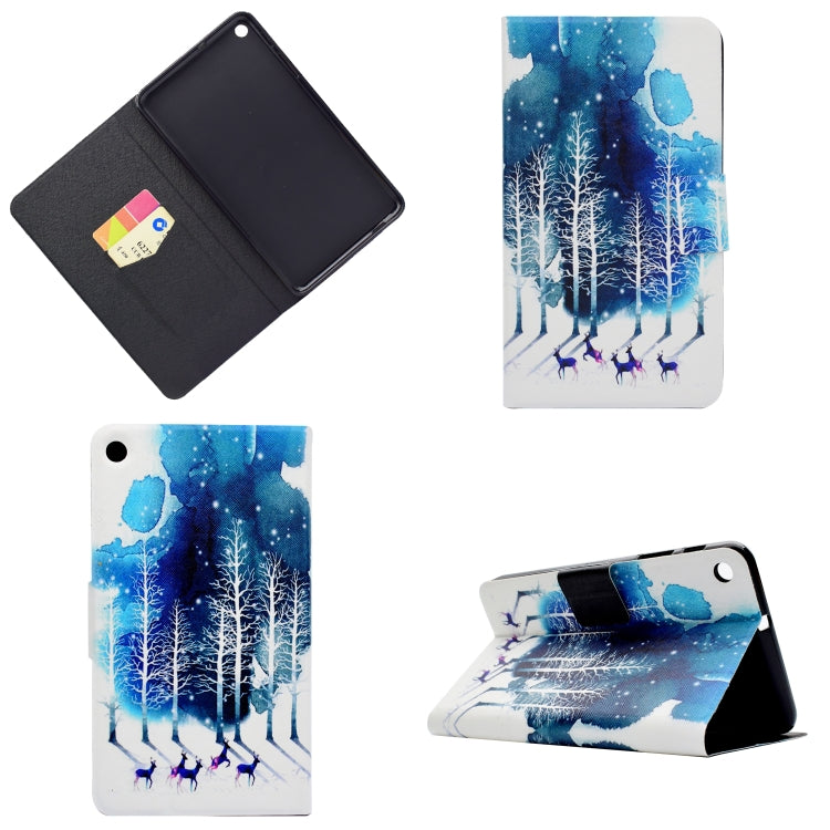 Tablet case with black interior and blue snowy forest front, folding stand view