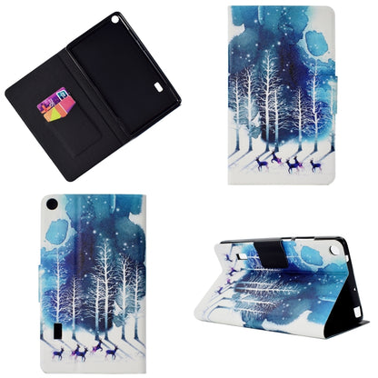 Tablet case with blue snowy forest design, flip cover, and angled stand display