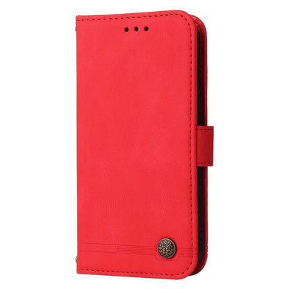 Red leather flip phone case with stitched edges and metal button closure
