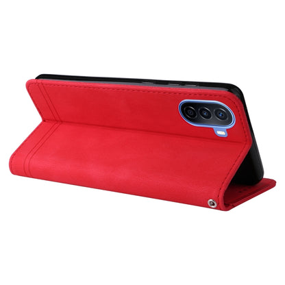 Red leather folio phone case with tri-camera cutout and kickstand