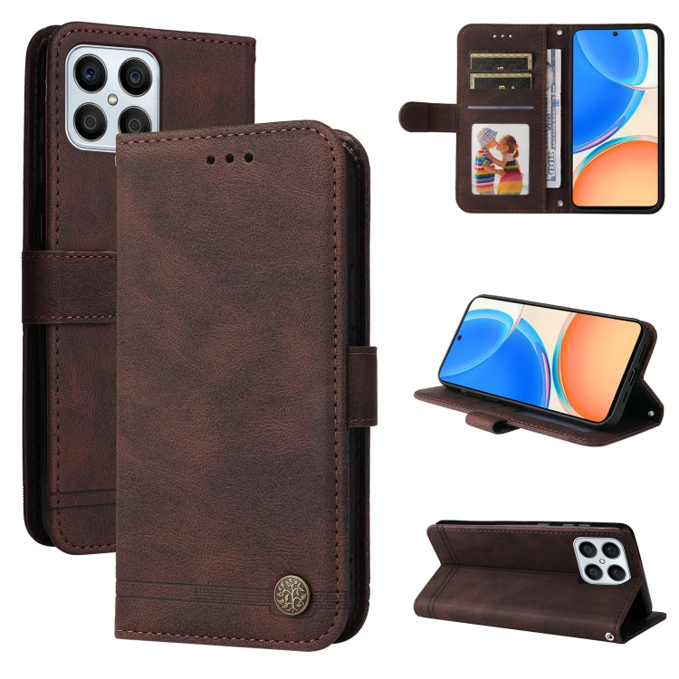 Brown leather wallet phone case with flip cover, card slots, and metal button closure