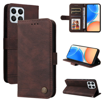 Brown leather wallet phone case with flip cover, card slots, and metal button closure