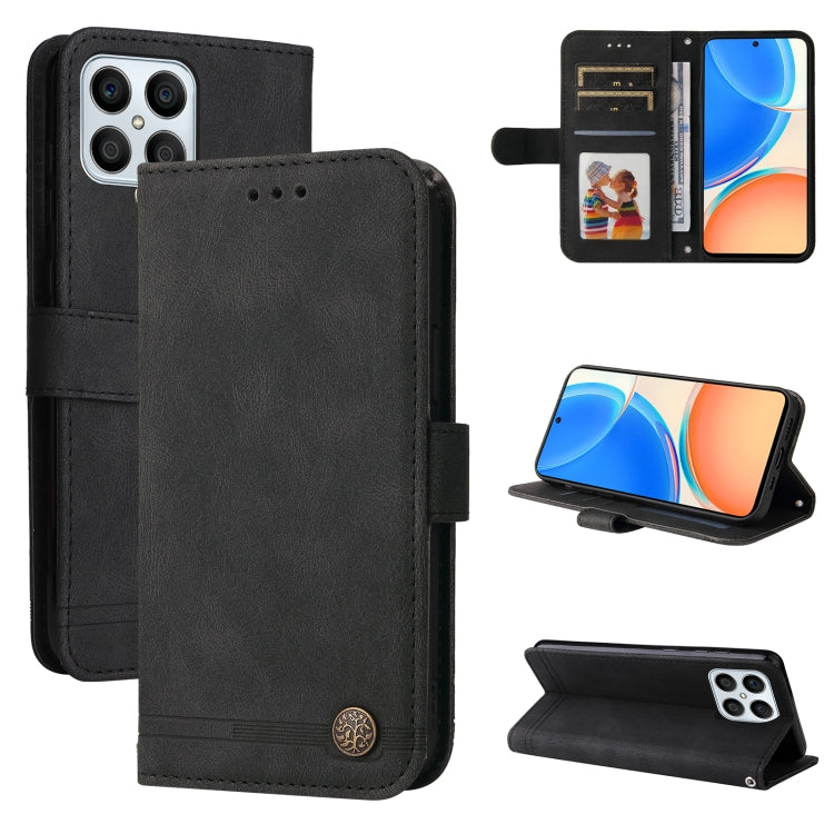Black leather wallet phone case with flip cover, card slots, and metal button closure