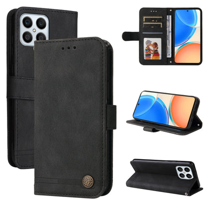 Black leather wallet phone case with flip cover, card slots, and metal button closure