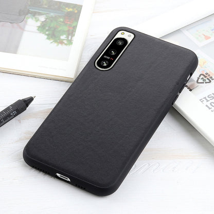 Lambskin leather phone case for Sony Xperia 5 IV, black with side openings and camera cutout.