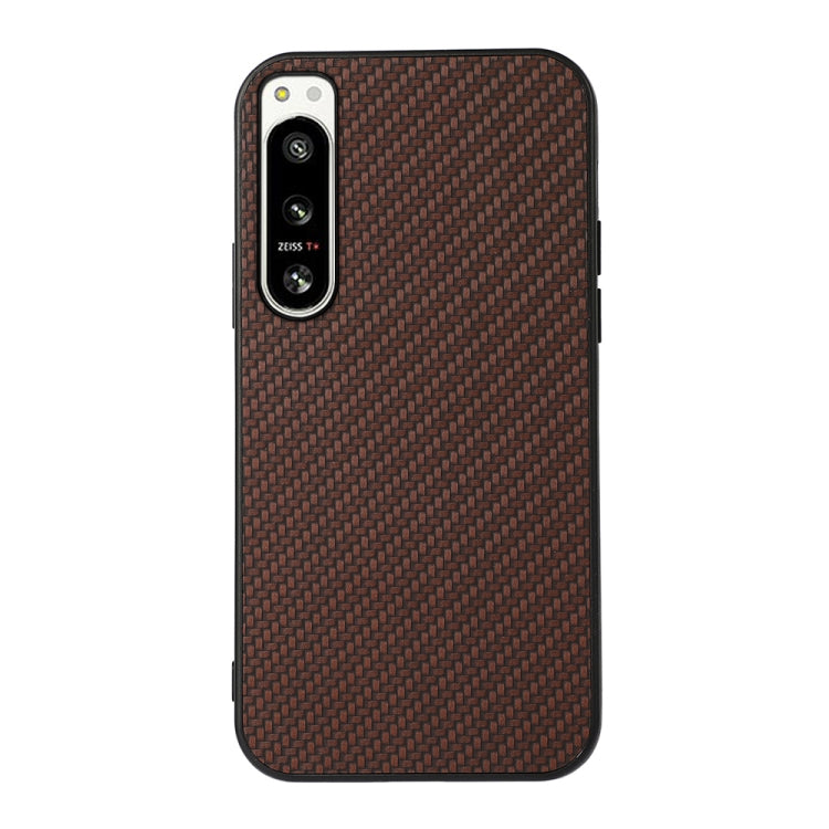 Brown carbon fiber texture PU phone case with raised camera ring and side cutouts