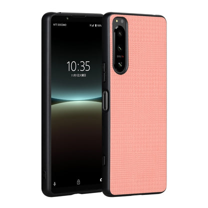 Pink shockproof phone case on phone with side buttons and camera cutout
