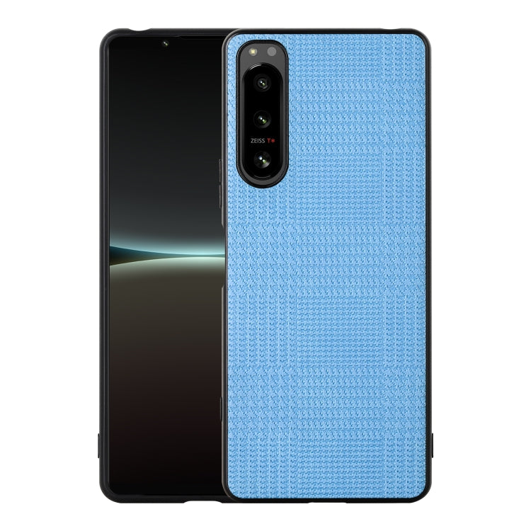 Blue shockproof phone case with textured back and camera cutout