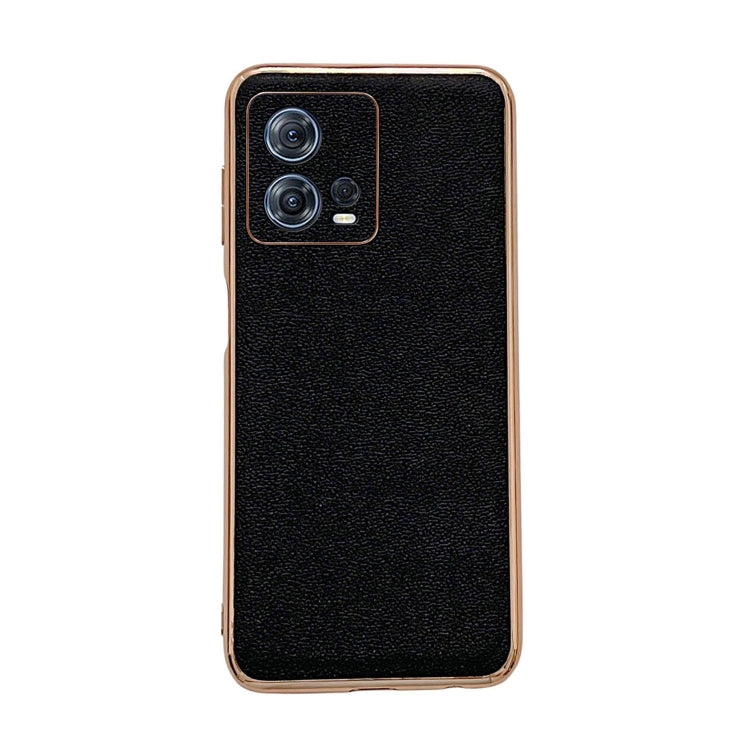 Genuine leather phone case with camera cutout, textured black finish, raised edges