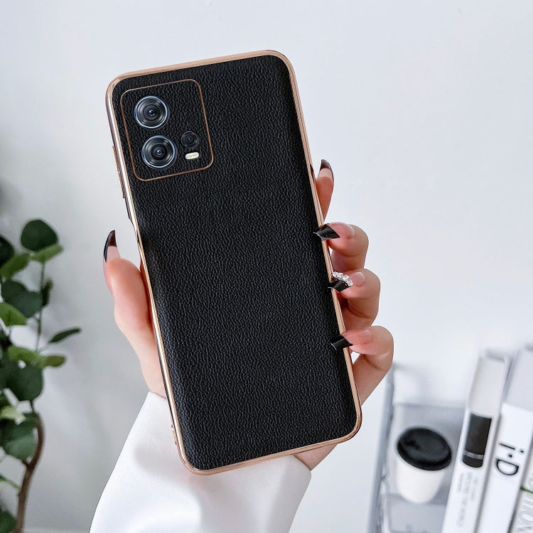 Genuine leather phone case, textured black with plated frame, camera cutout for protection