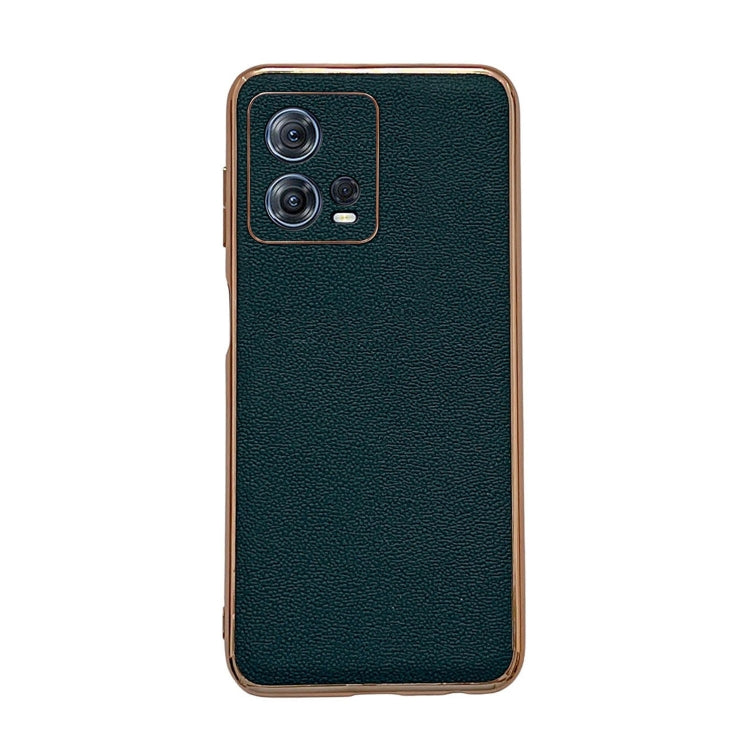Genuine leather phone case with camera cutout, textured dark green surface and protective lip