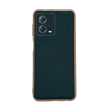 Genuine leather phone case with camera cutout, textured dark green surface and protective lip