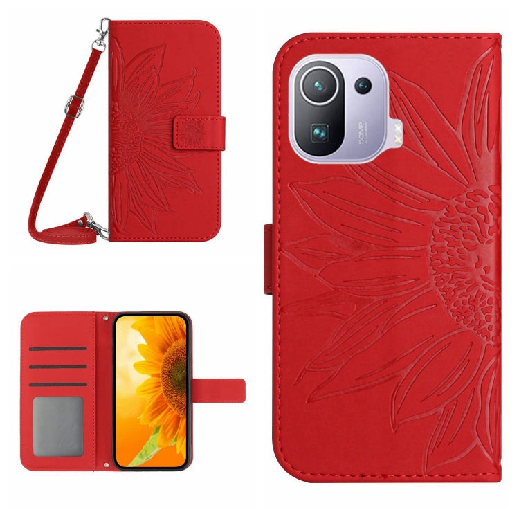 Flip leather phone case with sunflower pattern and wrist lanyard, red