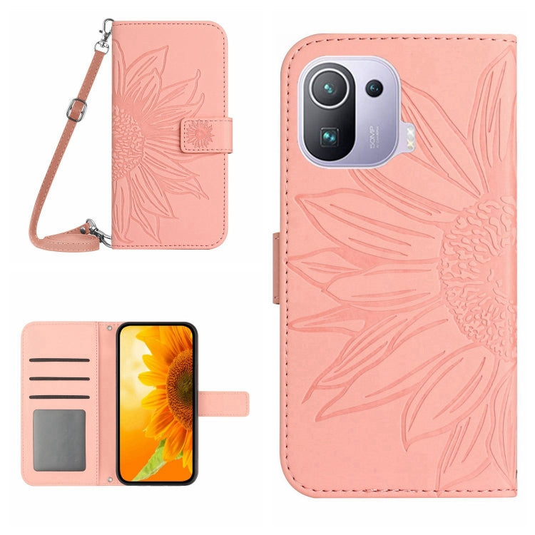 Flip leather phone case with sunflower pattern and wrist lanyard, light pink
