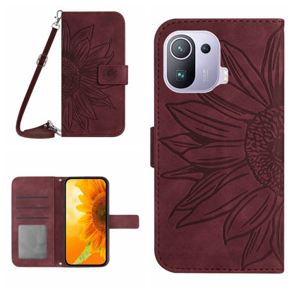 Flip leather phone case with sunflower pattern and wrist lanyard, wine red