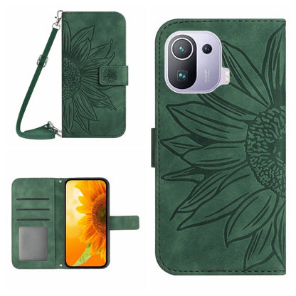 Dark green flip leather phone case with sunflower pattern, card slots, and wrist lanyard.