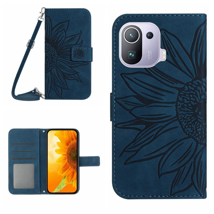 Navy flip leather phone case with sunflower pattern, card slots, and wrist lanyard.