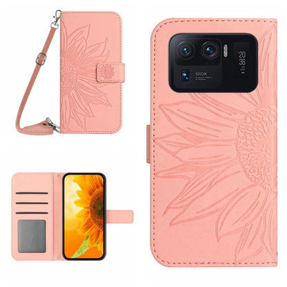Light pink flip leather phone case with sunflower pattern, card slots, and wrist lanyard.