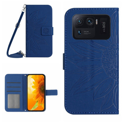 Blue flip leather phone case with sunflower pattern, card slots, and wrist lanyard.