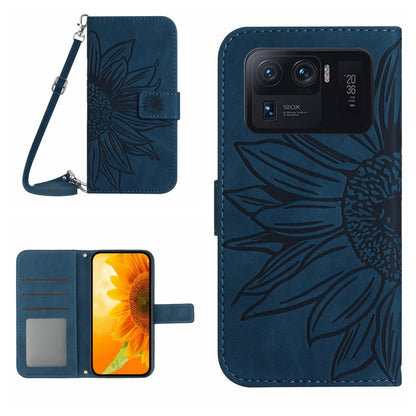 Dark blue flip leather phone case with sunflower pattern and card slots, plus wrist lanyard.
