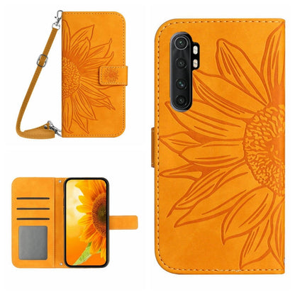 Orange flip leather phone case with sunflower pattern, card slot, and wrist lanyard.