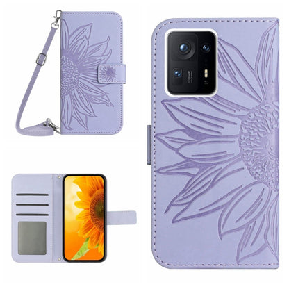 Light purple flip leather phone case with sunflower pattern, card slot, and wrist lanyard.