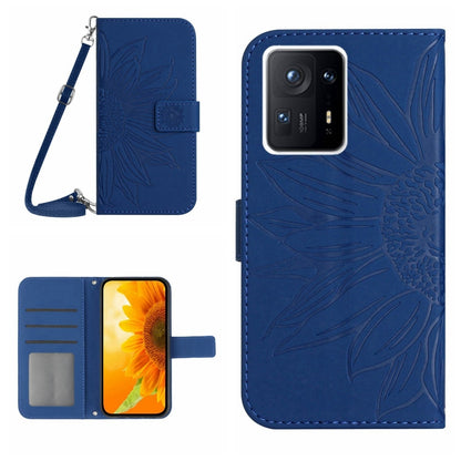 Inky blue flip leather phone case with sunflower pattern, card slot, and wrist lanyard.