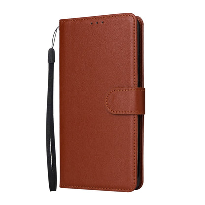 Brown leather flip phone case with front flap and wrist strap