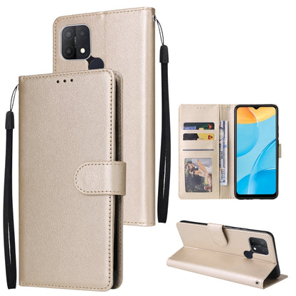 Gold leather horizontal flip phone case with three card slots and wrist strap