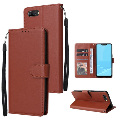Brown horizontal flip leather phone case with 3 card slots and kickstand