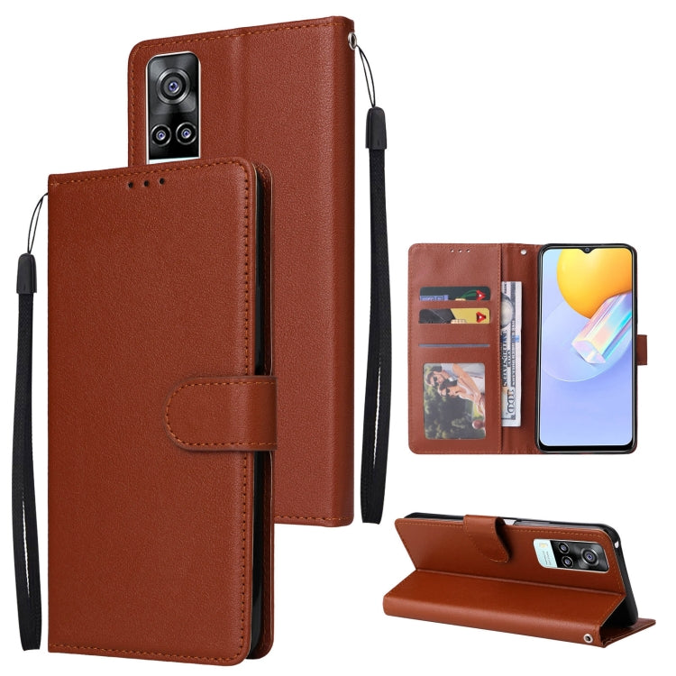 Brown leather wallet phone case with horizontal flip and three card slots, wrist strap