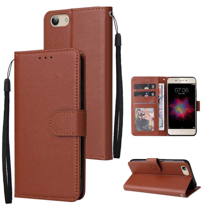 Brown leather flip phone case with three card slots and wrist strap, includes stand