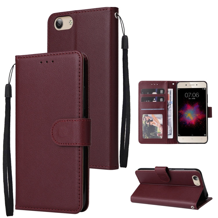 Wine red leather flip phone case with three card slots and wrist strap, includes stand