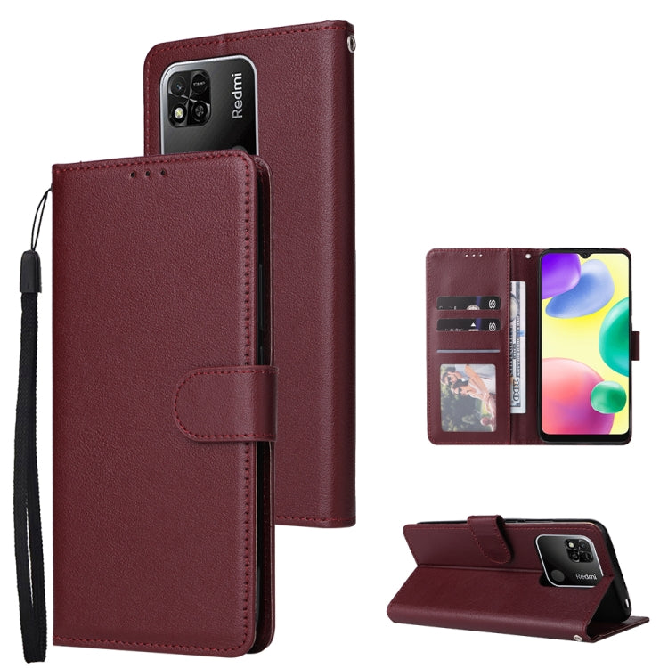 Burgundy leather flip phone case with three card slots and side wrist strap
