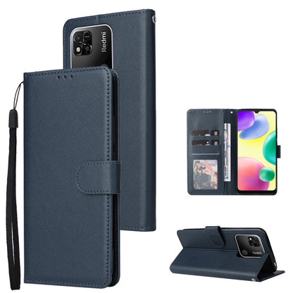 Navy blue leather flip phone case with three card slots and side wrist strap