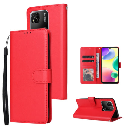 Red leather flip phone case with three card slots and side wrist strap