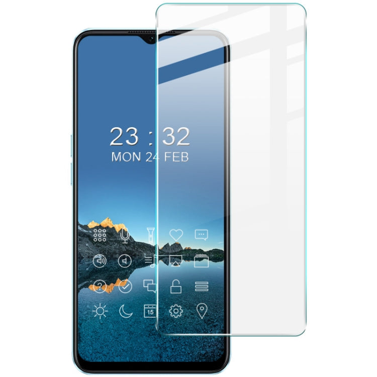 Tempered glass screen protector film on smartphone screen, clear glossy finish