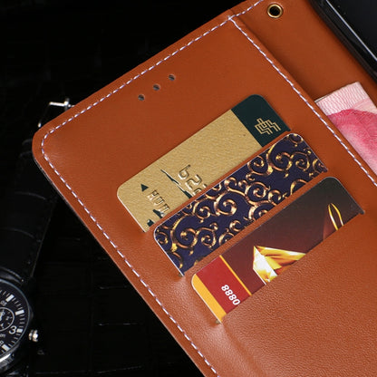 Tan leather interior of crocodile-texture phone wallet case with card slots and stitching