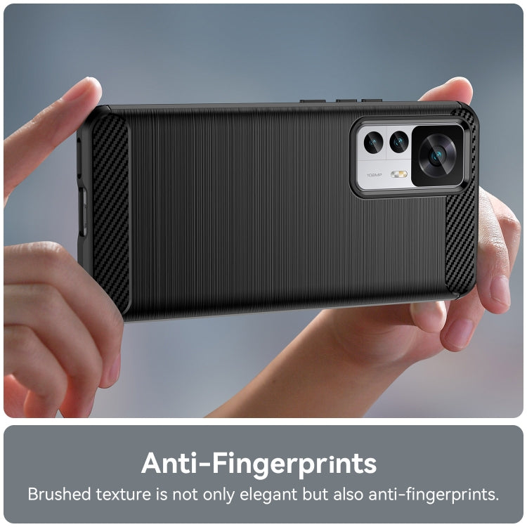 Brushed texture TPU phone case for Xiaomi 12T Pro, black, held in hands—back camera cutouts