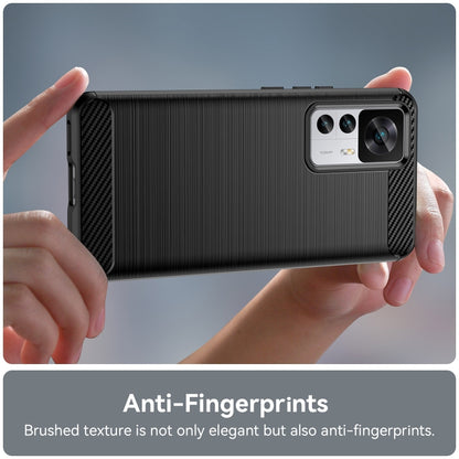 Brushed texture TPU phone case for Xiaomi 12T Pro, black, held in hands—back camera cutouts