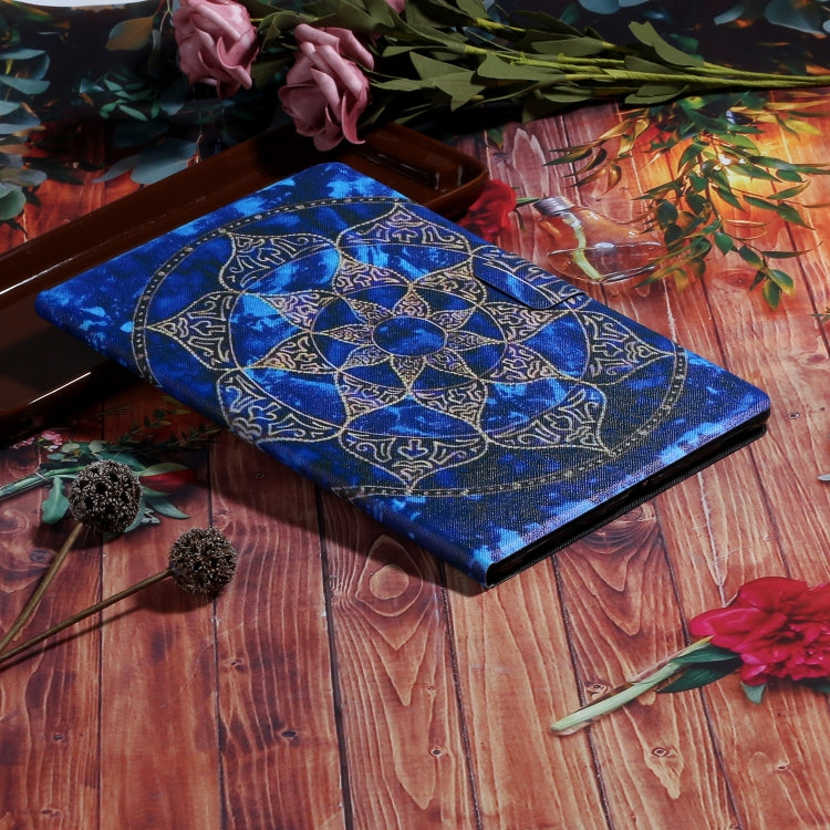 Blue mandala patterned tablet case lying flat with circular emblem