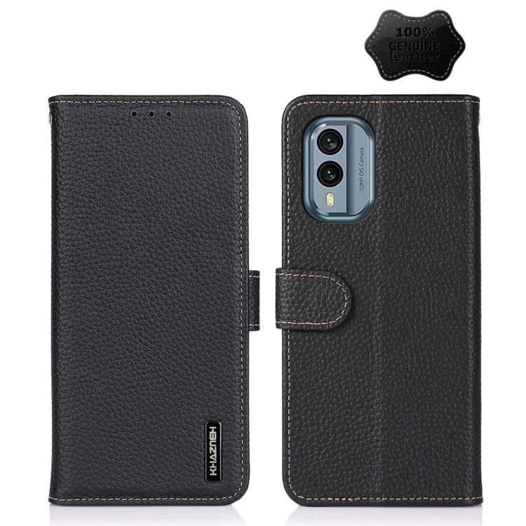 Black genuine leather litchi phone case with folio flap, camera cutout, and strap