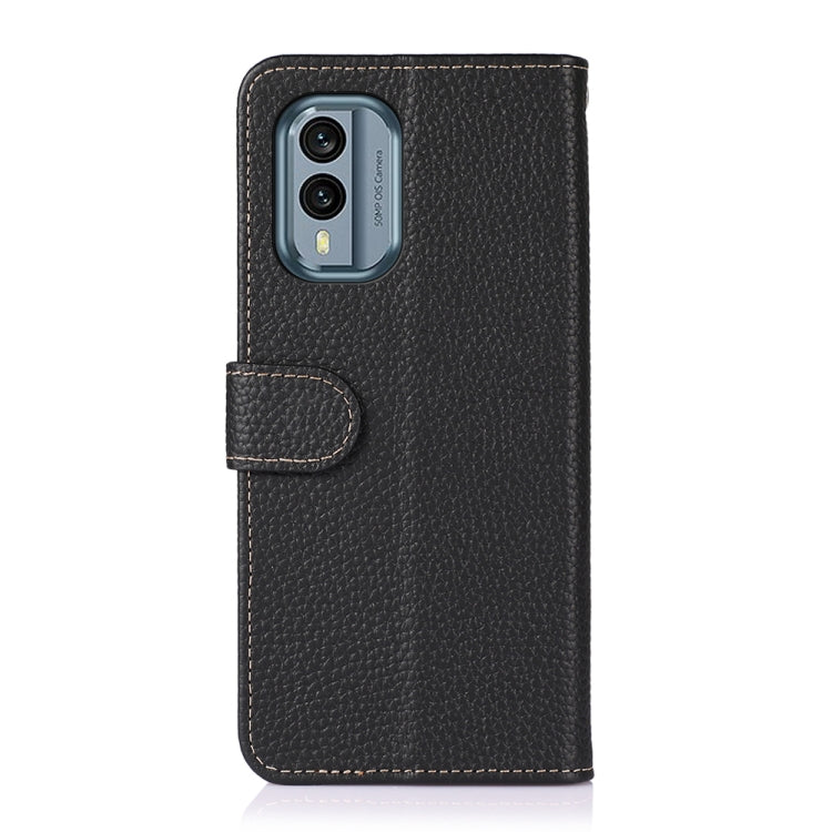 Black genuine leather phone case with camera cutout and snap folio flap