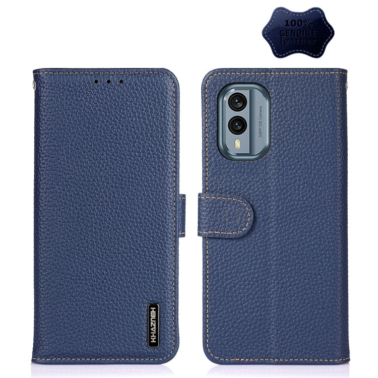 Blue genuine leather litchi phone case with folio flap, camera cutout, and strap